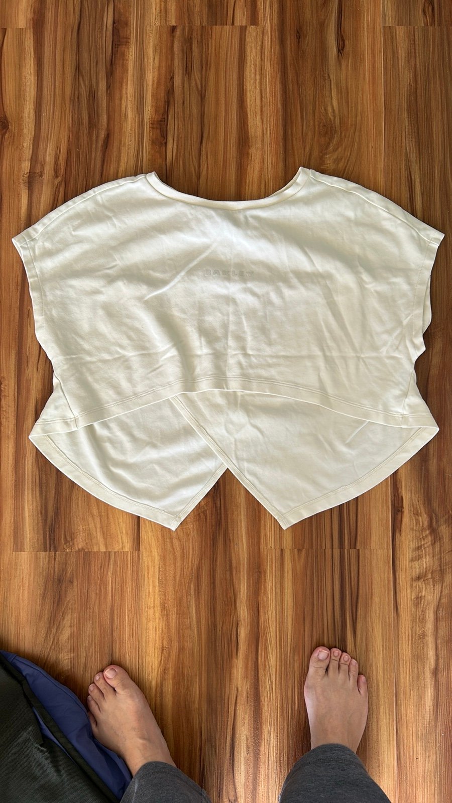 Oakley White Asymmetrical Relaxed Tops