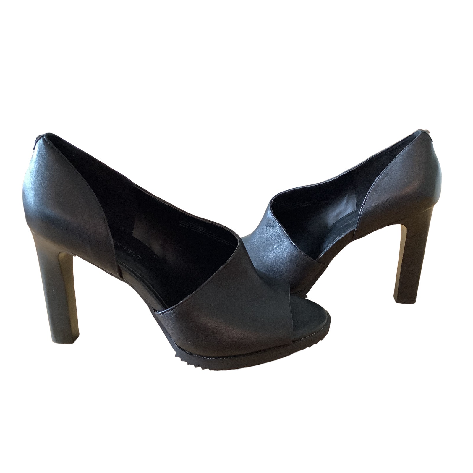 **FROM THE SET OF GEORGE & TAMMY** KARL LAGERFELD “BRETTIE” PUMPS 10