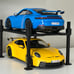 Two 1/18 scale Diecast Porsche 911 gt3 and 4 post car lift display blue yellow