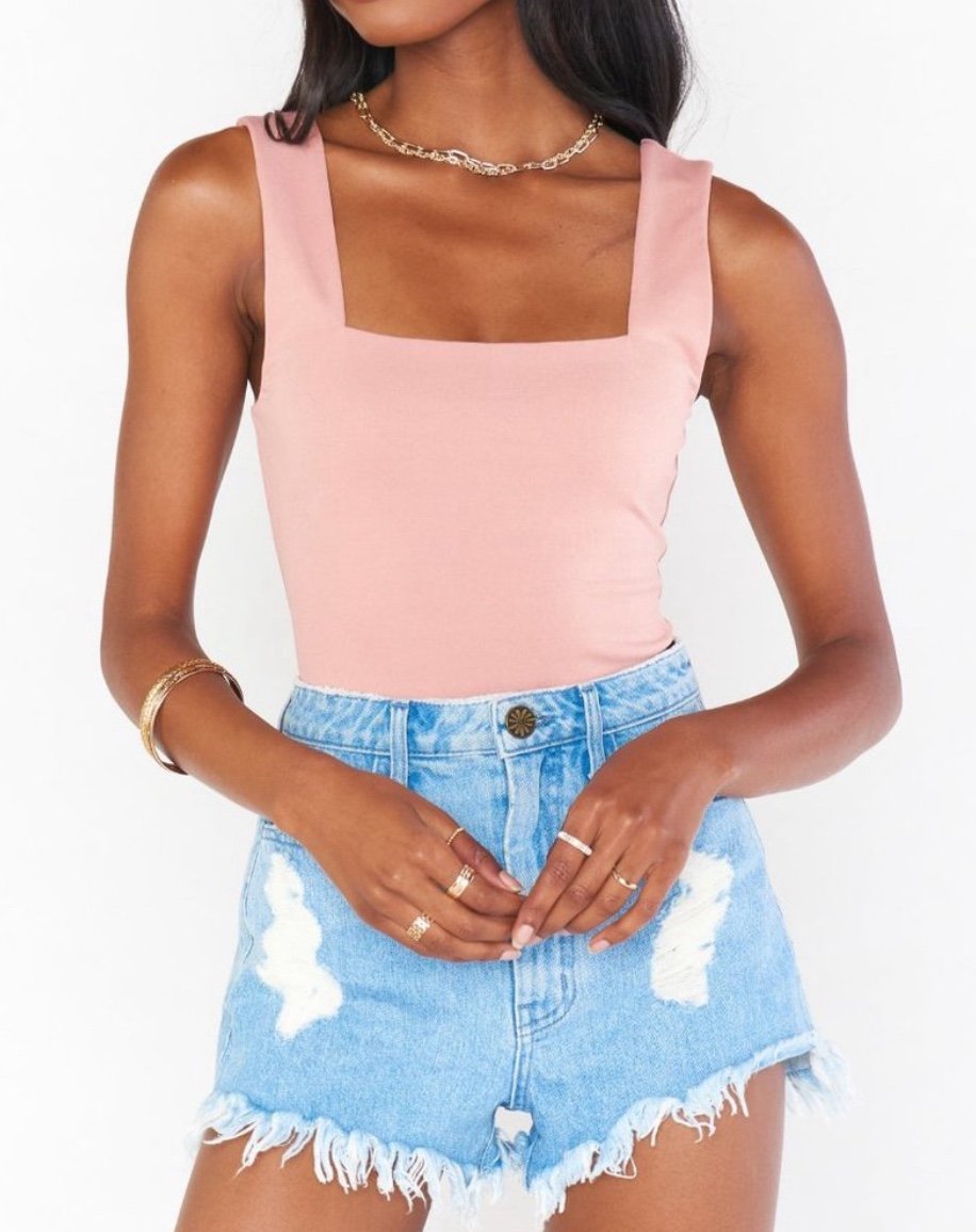 Show Me Your Mumu Dory Bodysuit in the color dusty pink is a basic bodysuit with