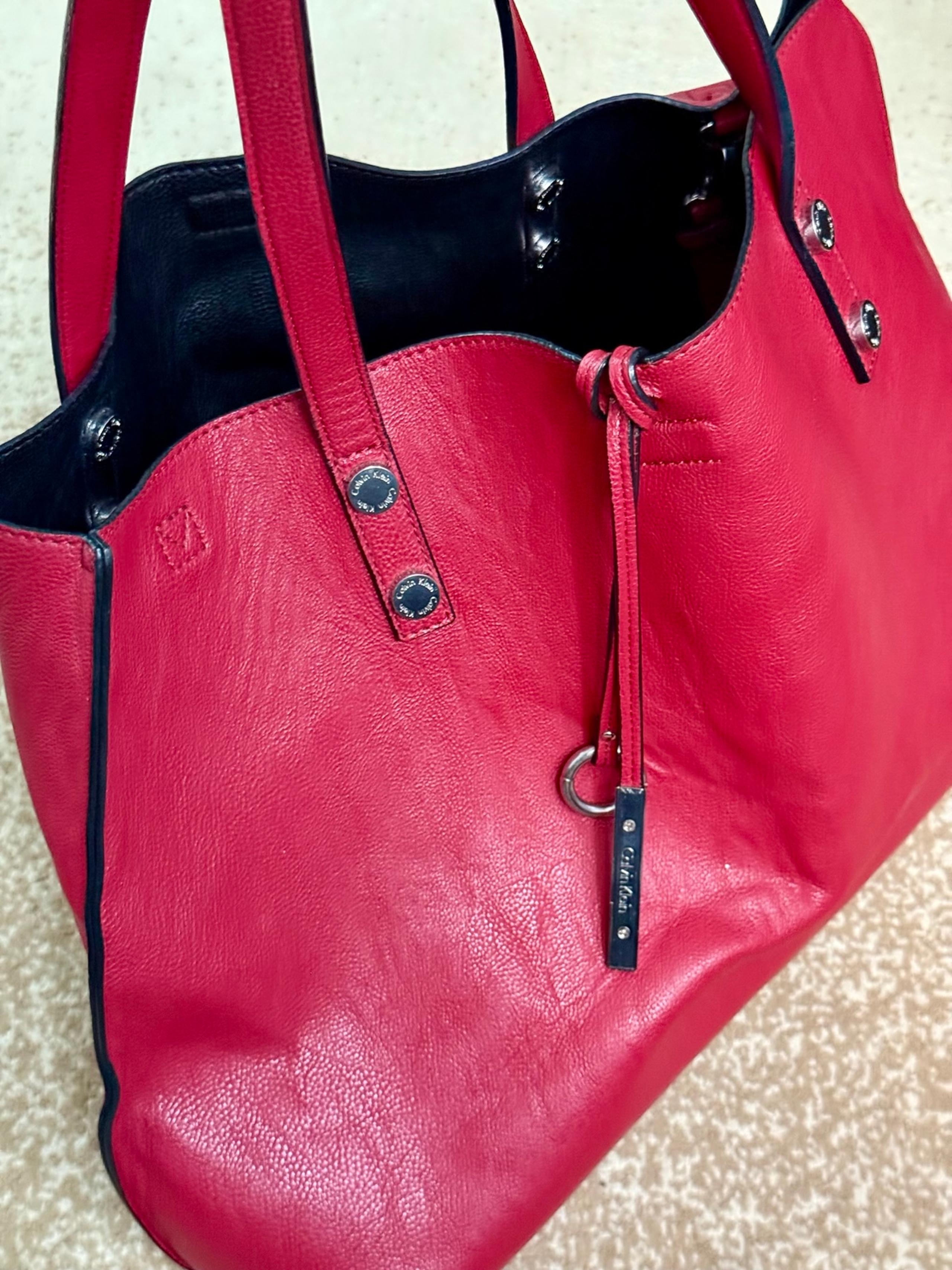 Calvin Klein handbags for women,red color large size ,21 width,13 height,leather