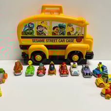 1982 Sesame Street car case with 12 individual vehicles by Hasbro