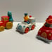 1982 Sesame Street car case with 12 individual vehicles by Hasbro