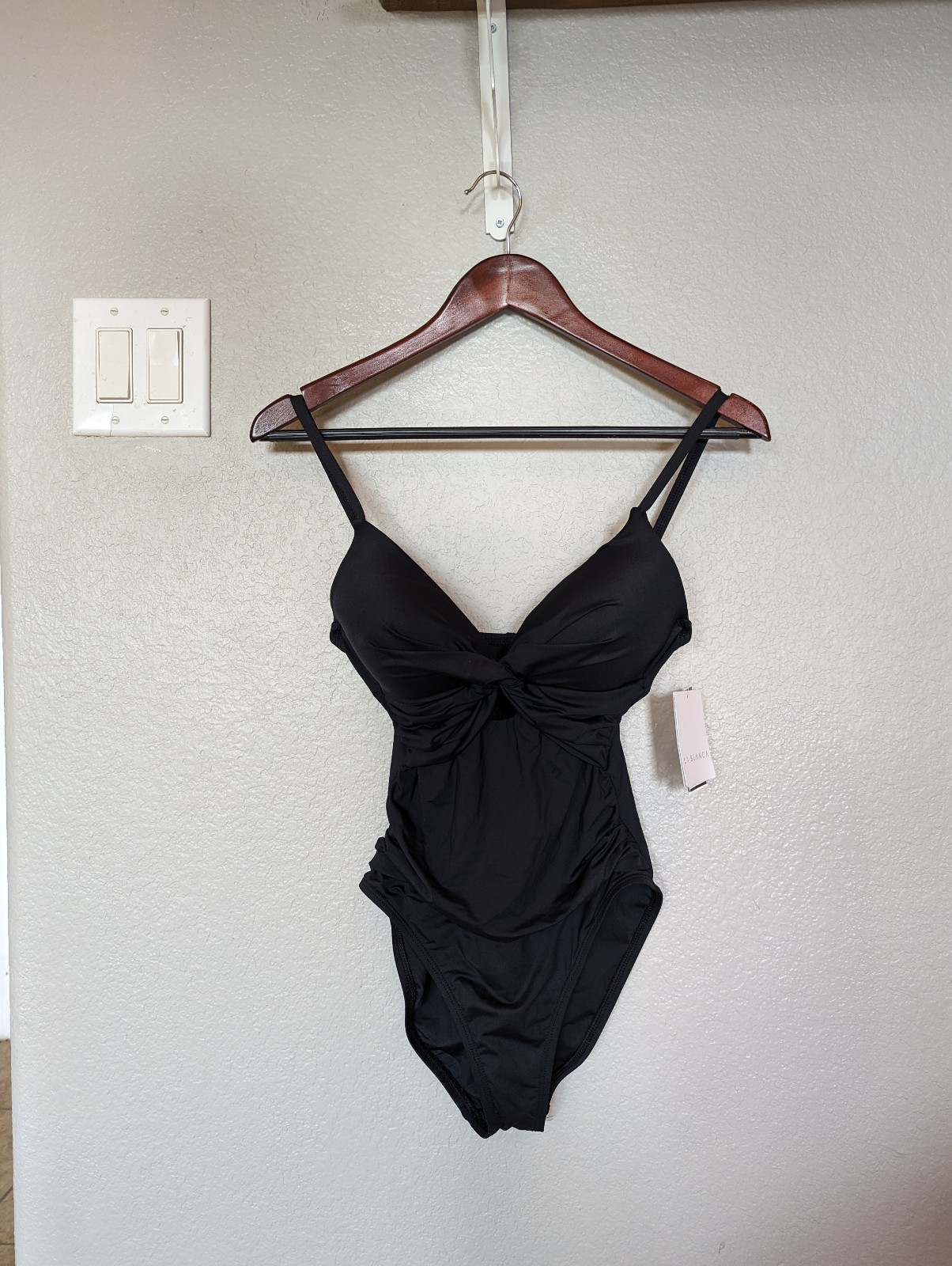 La Blanca / black one piece with peep hole Sz 4