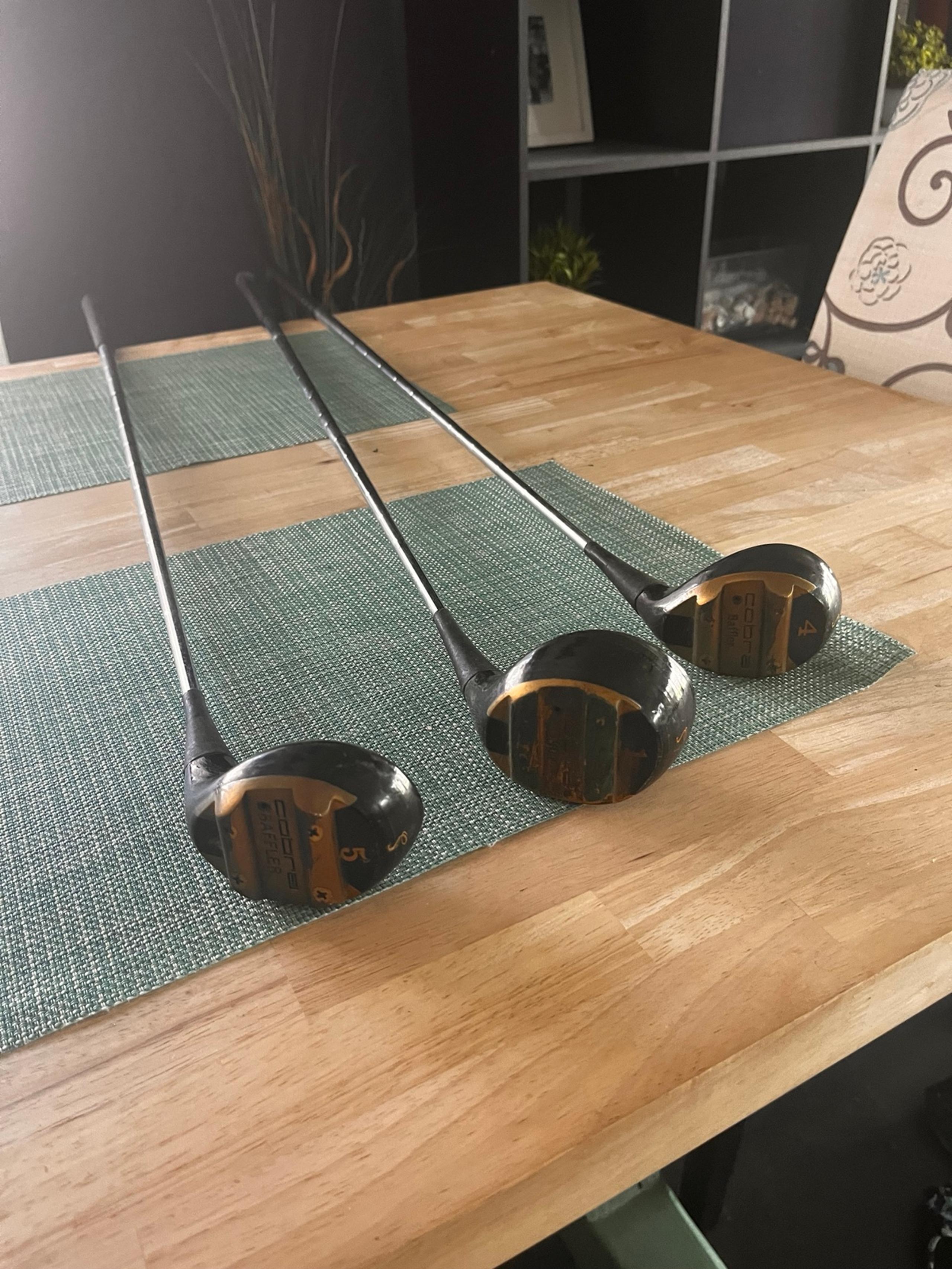 Vintage cobra raffles golf clubs
