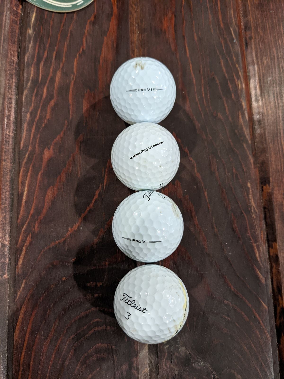 49 Titleist golf balls- 33 Pro V1