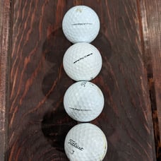 49 Titleist golf balls- 33 Pro V1