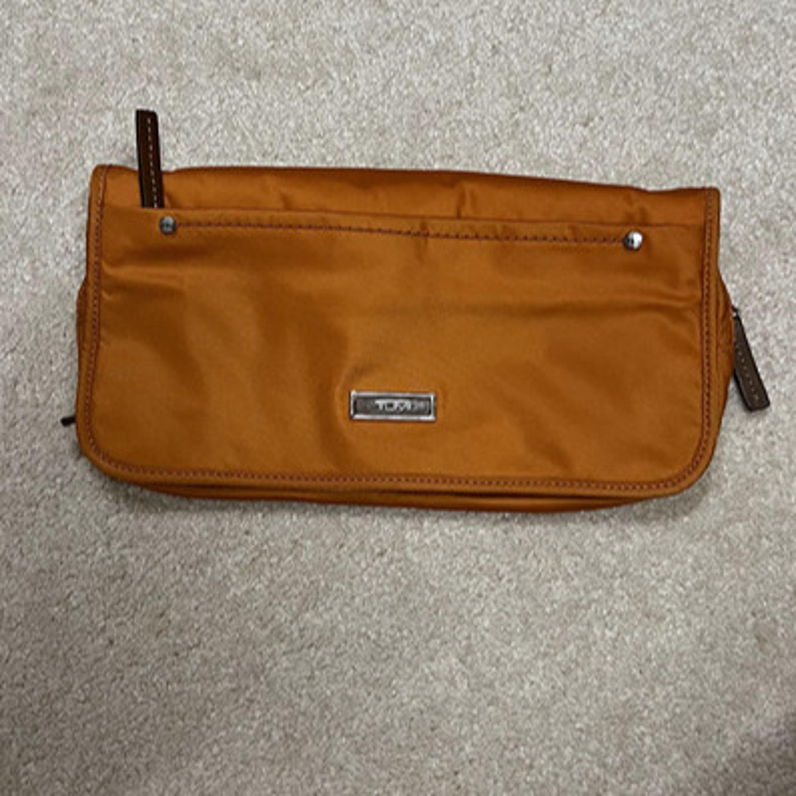 Tumi cosmetic bag