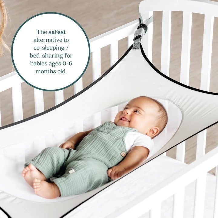 CRESCENT WOMB INFANT SAFETY BED