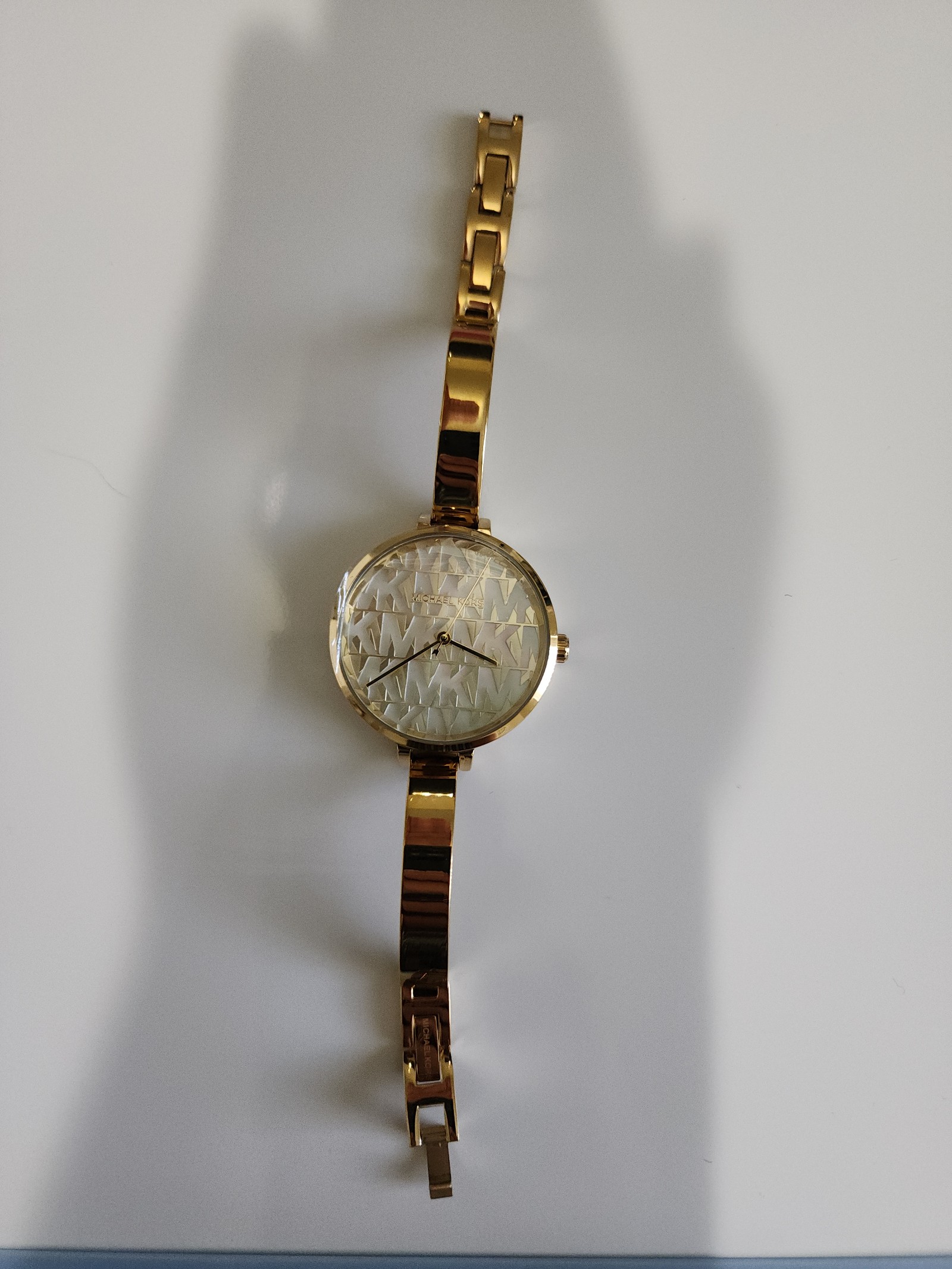 Michael Kors Naia gold-tone logo watch for women