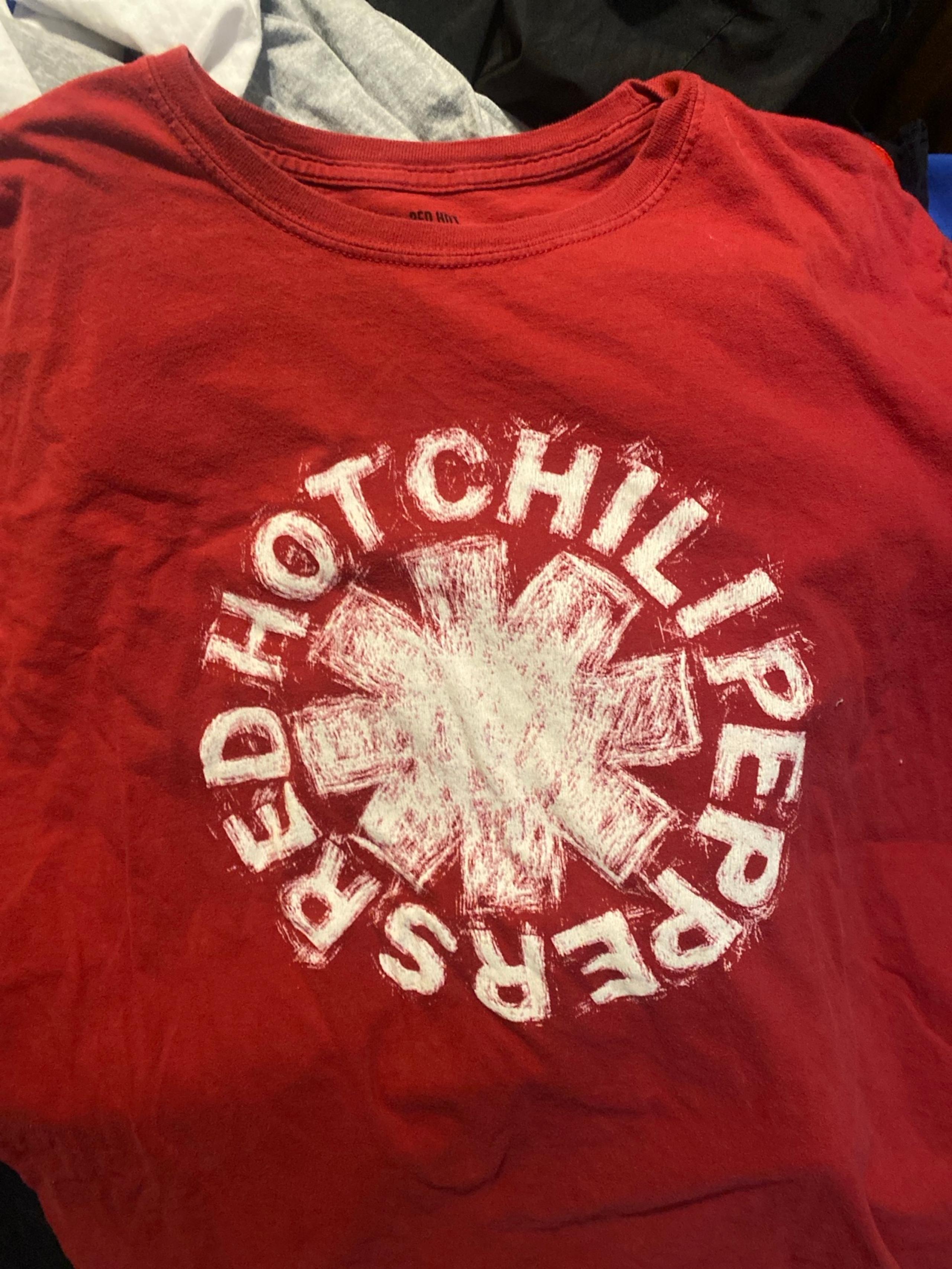 Red left sleeve  left armpit is roached gonna let this go for a great price