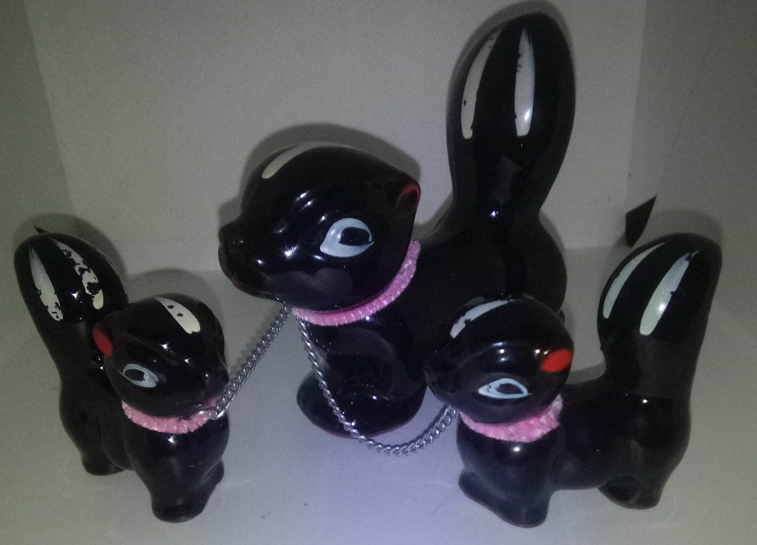 Vintage Skunk Set Chained Together