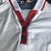 ROCKPORT 2004 Women’s Red White & Blue Polo size Medium