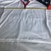 ROCKPORT 2004 Women’s Red White & Blue Polo size Medium