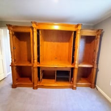 entertainment center The center piece is for sale. 2 end pieces we're sold separ