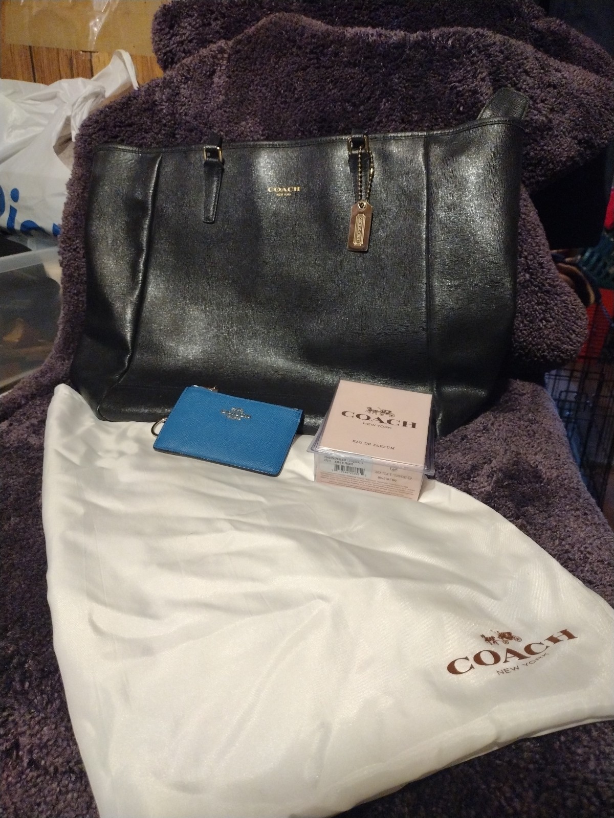 Coach purse( used once) , wallet and perfume (brand new never been used)