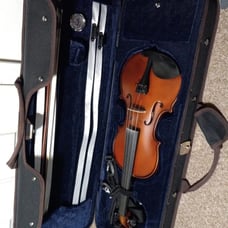 Violin and bow with violin case and violin learning book