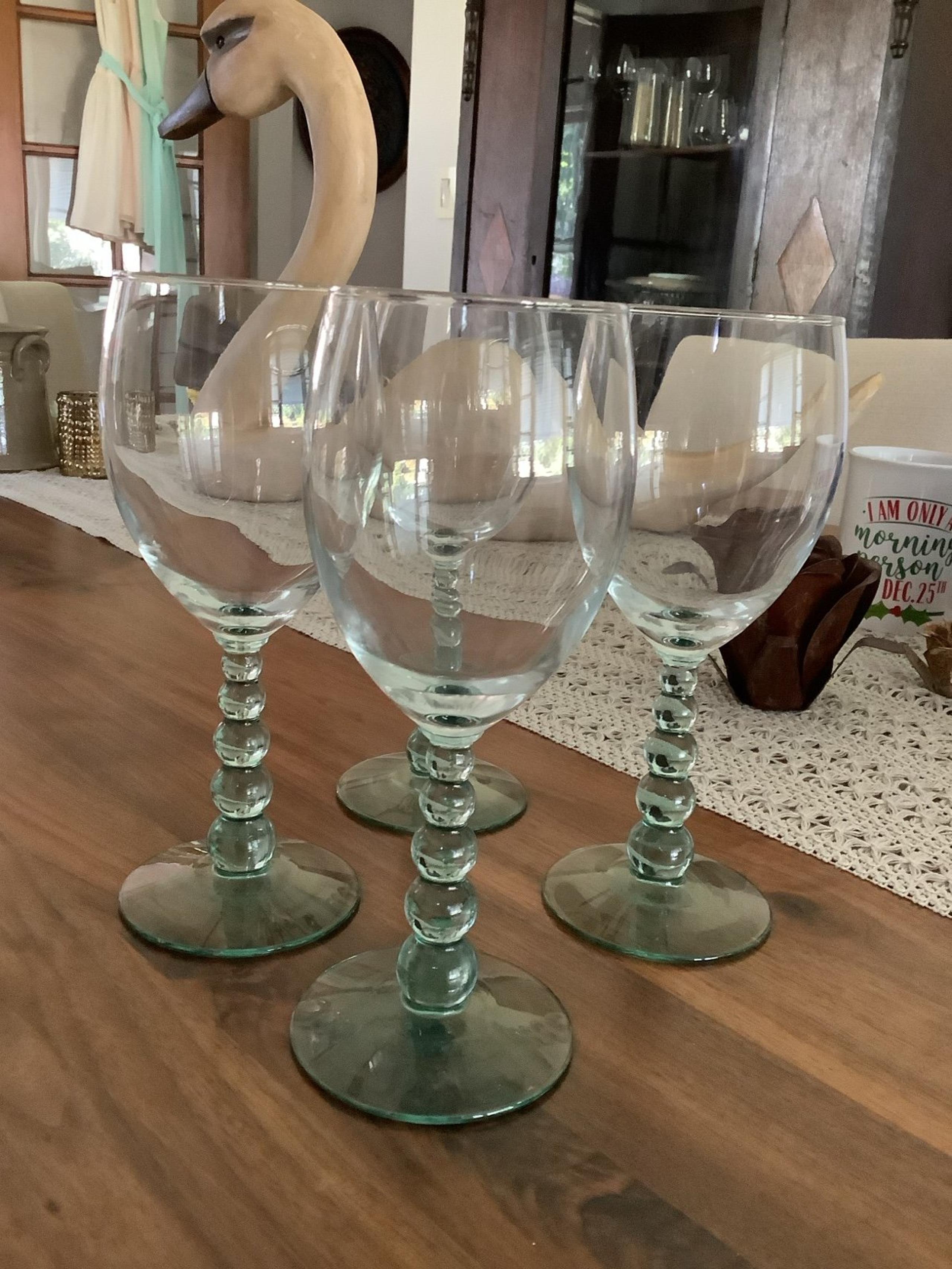 Set of four* 8 inch Spanish green blown wine goblets