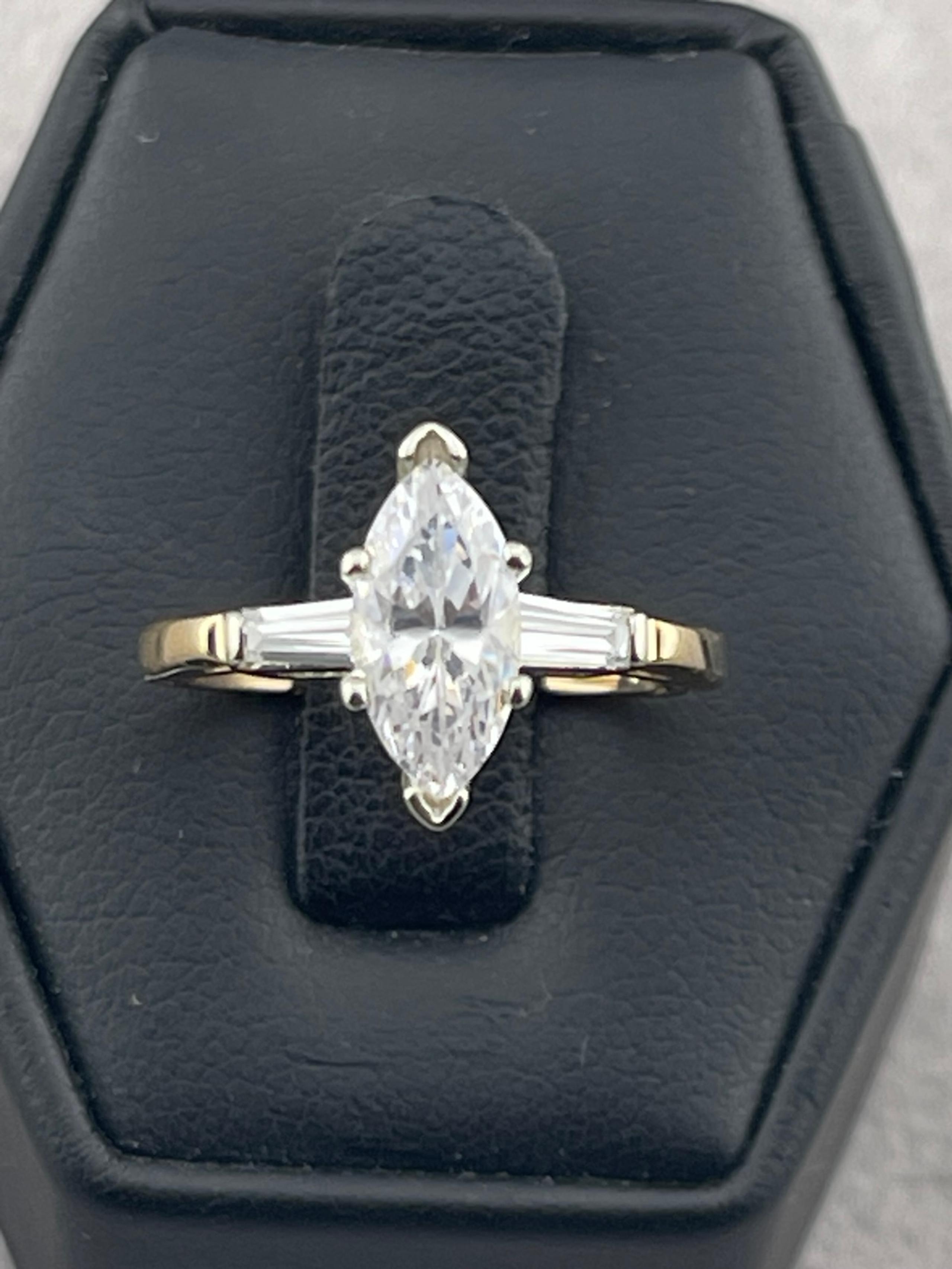 Modern 1 1/4 carat tw simulator, diamond, ring 14 Karat white, a yellow gold