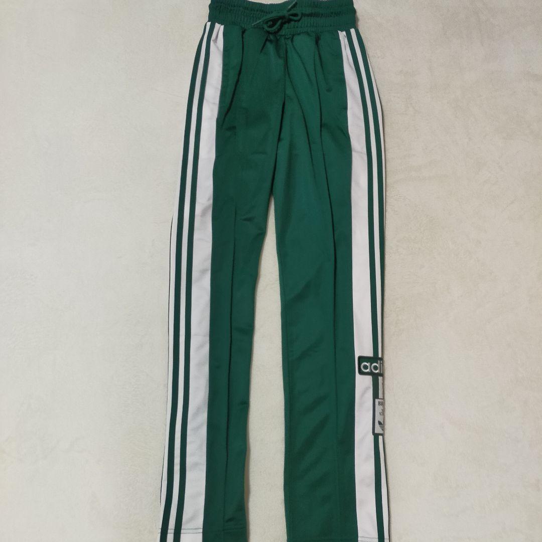 Brand new, unused Adidas Adibreak pants, green, women's size S.