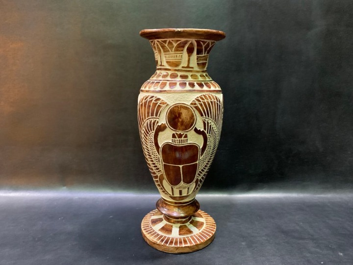 Ancient egyptian vase with hand-carved scarab, handmade
