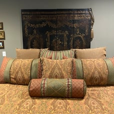 Coordinating tapestry throw pillows, shams and King sz dust ruffle.