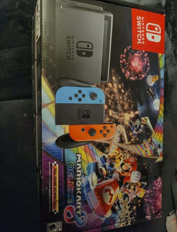 Nintendo Switch with Blue and Red Joy-Co