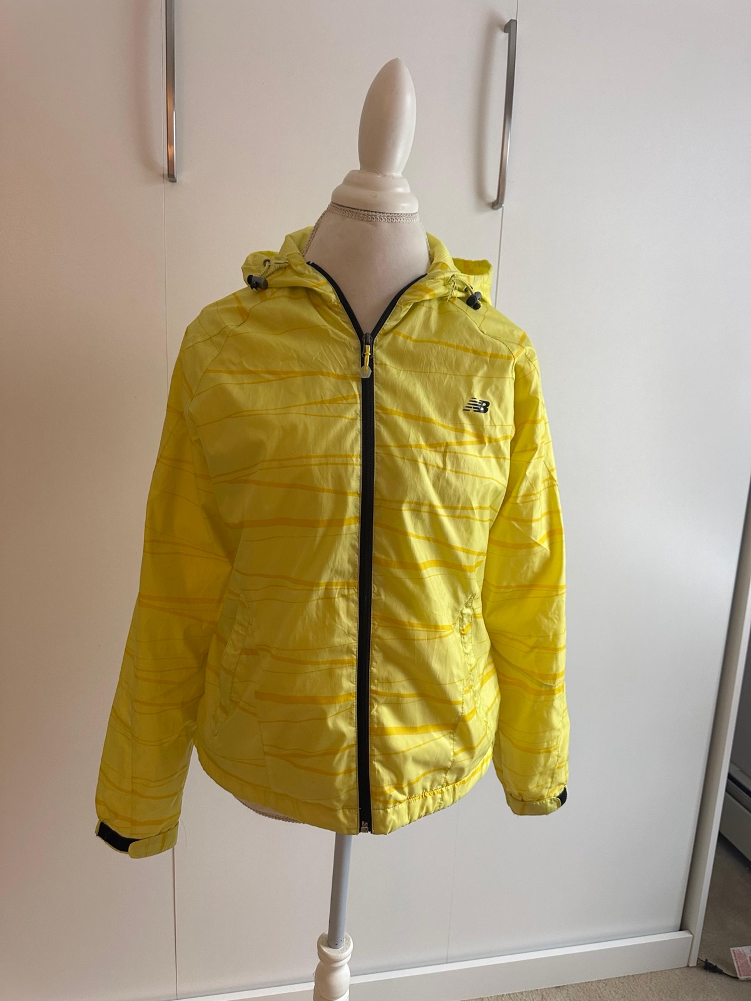 New Balance Yellow wind breaker women’s L with hood