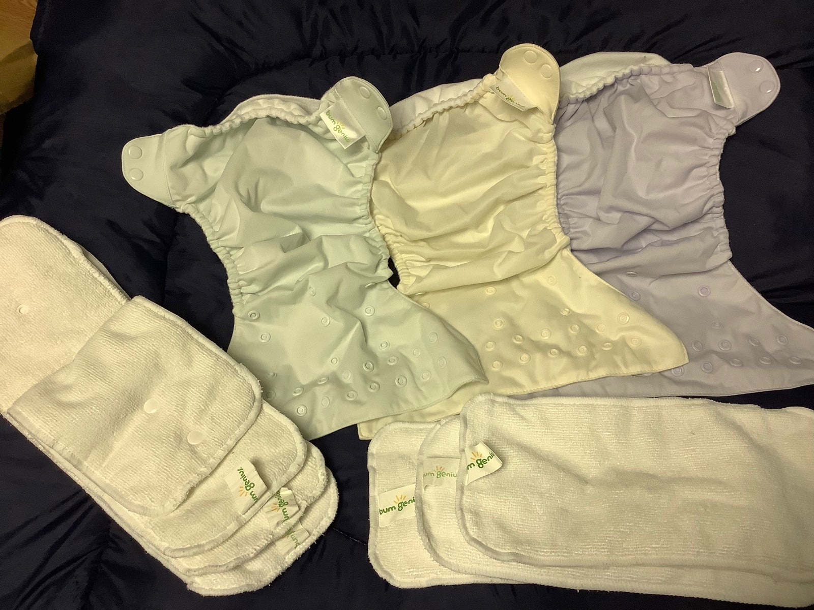 Bum Genius pocket cloth diapers set with inserts and extra liners