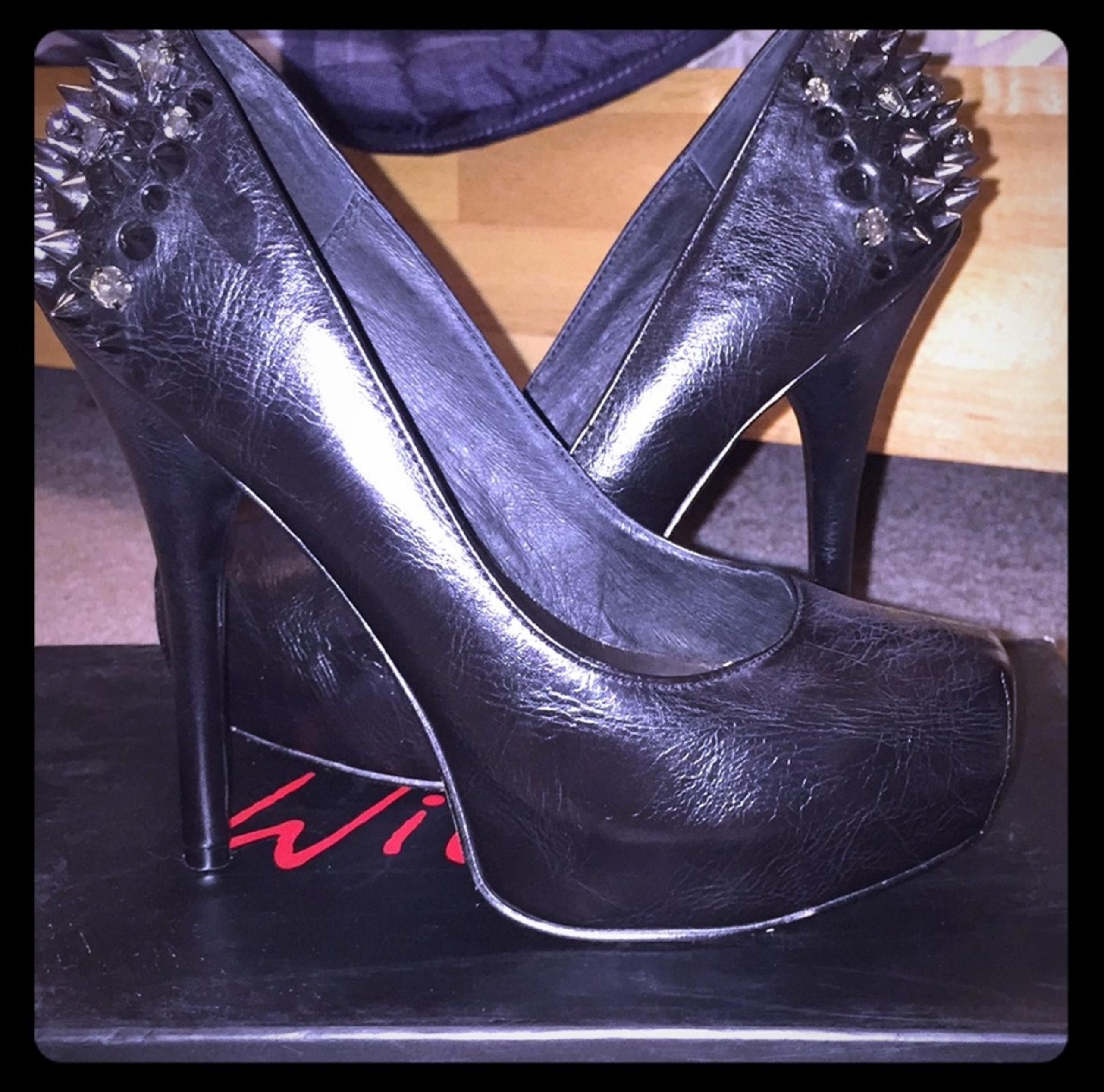 Wild Pair Spiked Heels