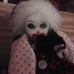 Porcelain clown doll