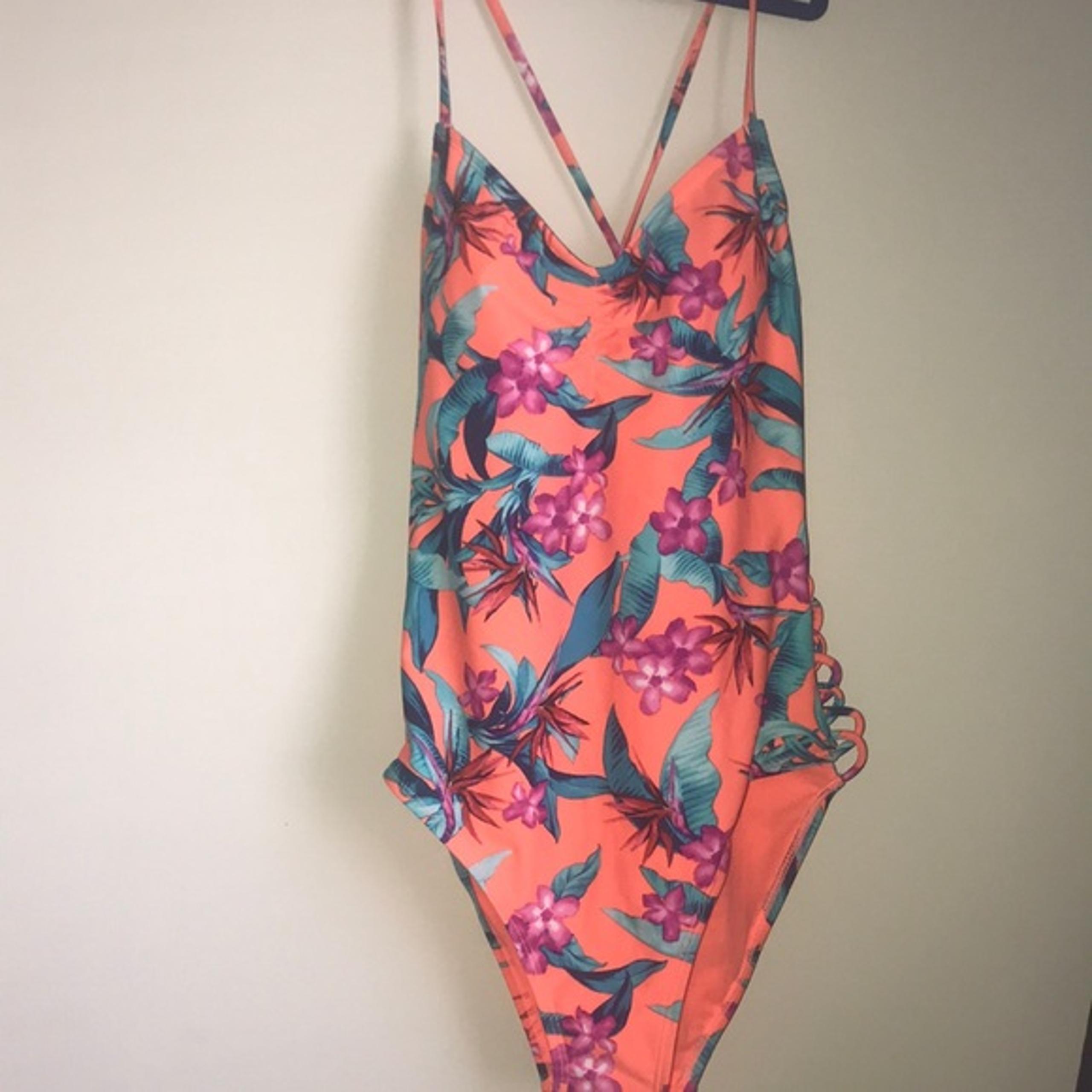 - New Hula Honey Lace Up Cutou- New Hula Honey Lace Up Cutout One Piece Swimsuit