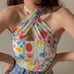 With jean tulip halter top
