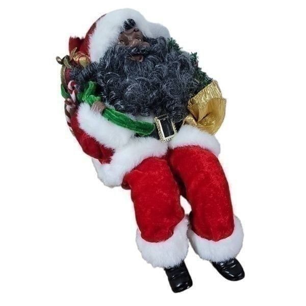 Sitting Santa Claus with toy sac