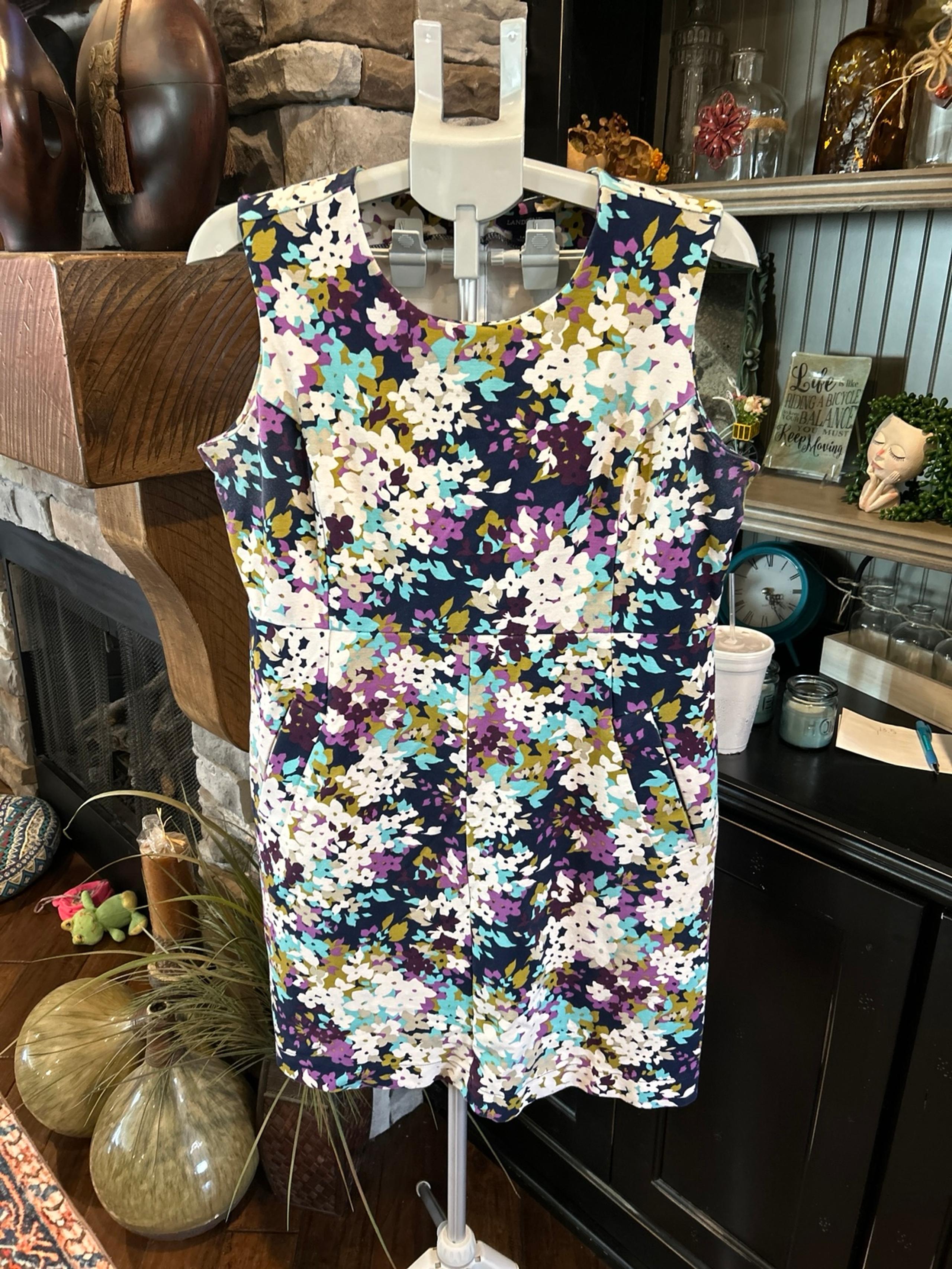 Lands Ends floral sheath dress with pockets. It is new without tags.