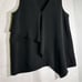 Halston Women's size XS Sleeveless Asymmetrical Flowy Soft Black Top