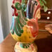 12” RUSTIC, STONEWARE ROOSTER FEATURING A BEAUTIFUL DISPLAY OF COLOR.