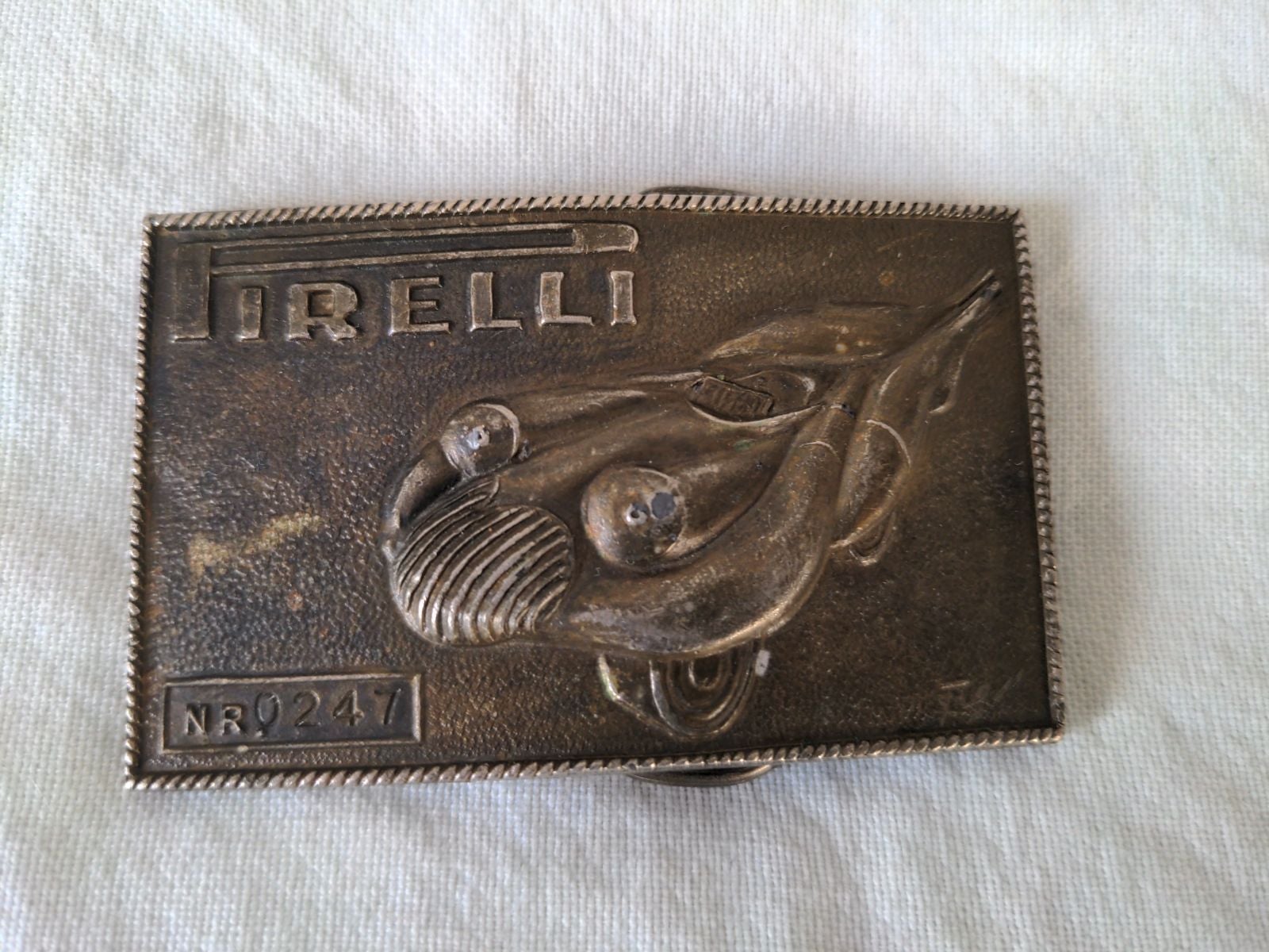 Salvador Dali Belt Buckle: Pirelli