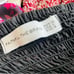 Faithfull the Brand MEDIUM Eryn black tiered puff sleeve tied back mini dress