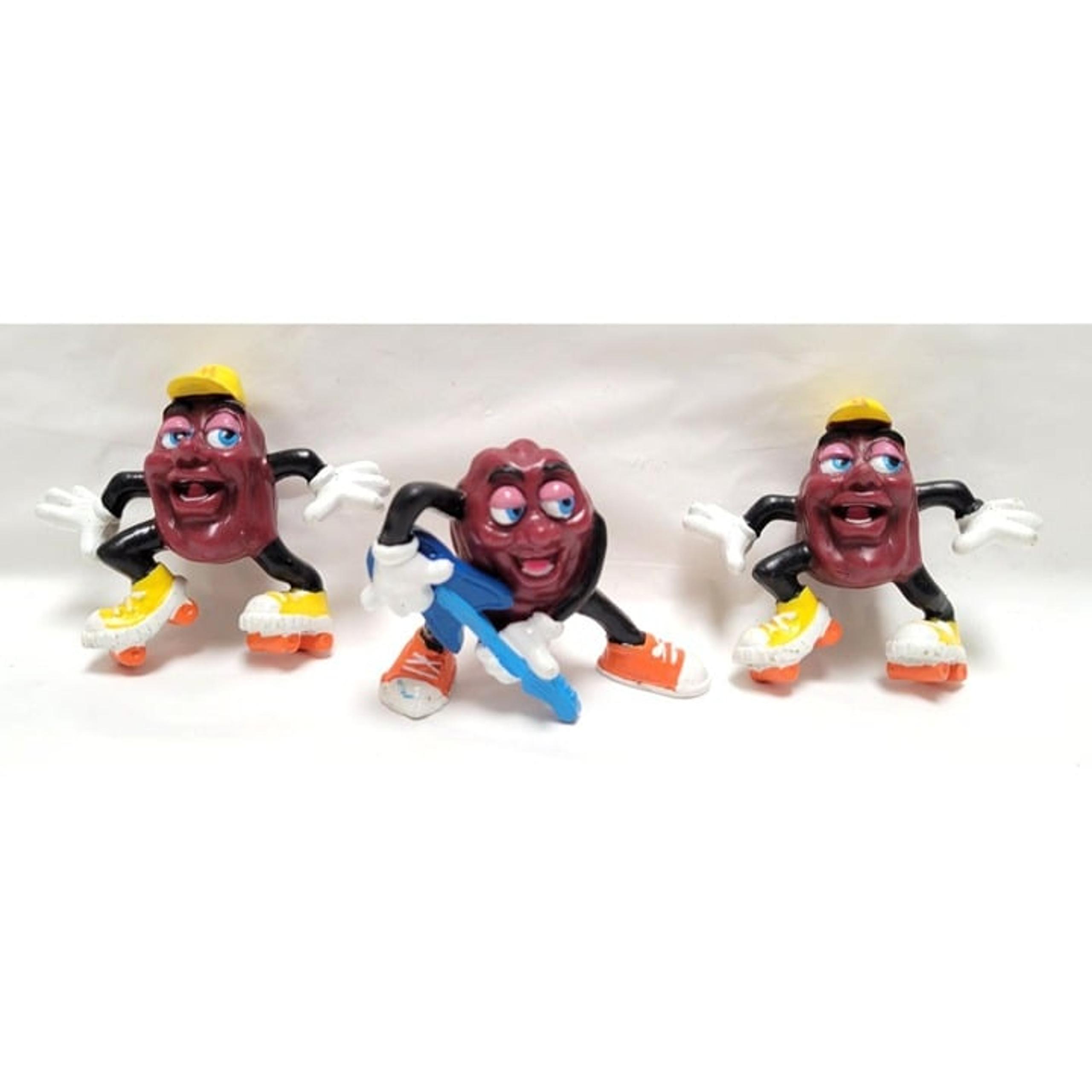 Lot of 3 Vintage California Raisins PVC Figurines Roller Skating Playing Guitar