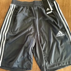 Four pairs of men’s shorts, size small. New with tags. Adidas and Nike.