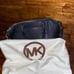 Black Michael Kors purse with handles and long strap