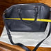 Black Michael Kors purse with handles and long strap