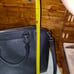 Black Michael Kors purse with handles and long strap