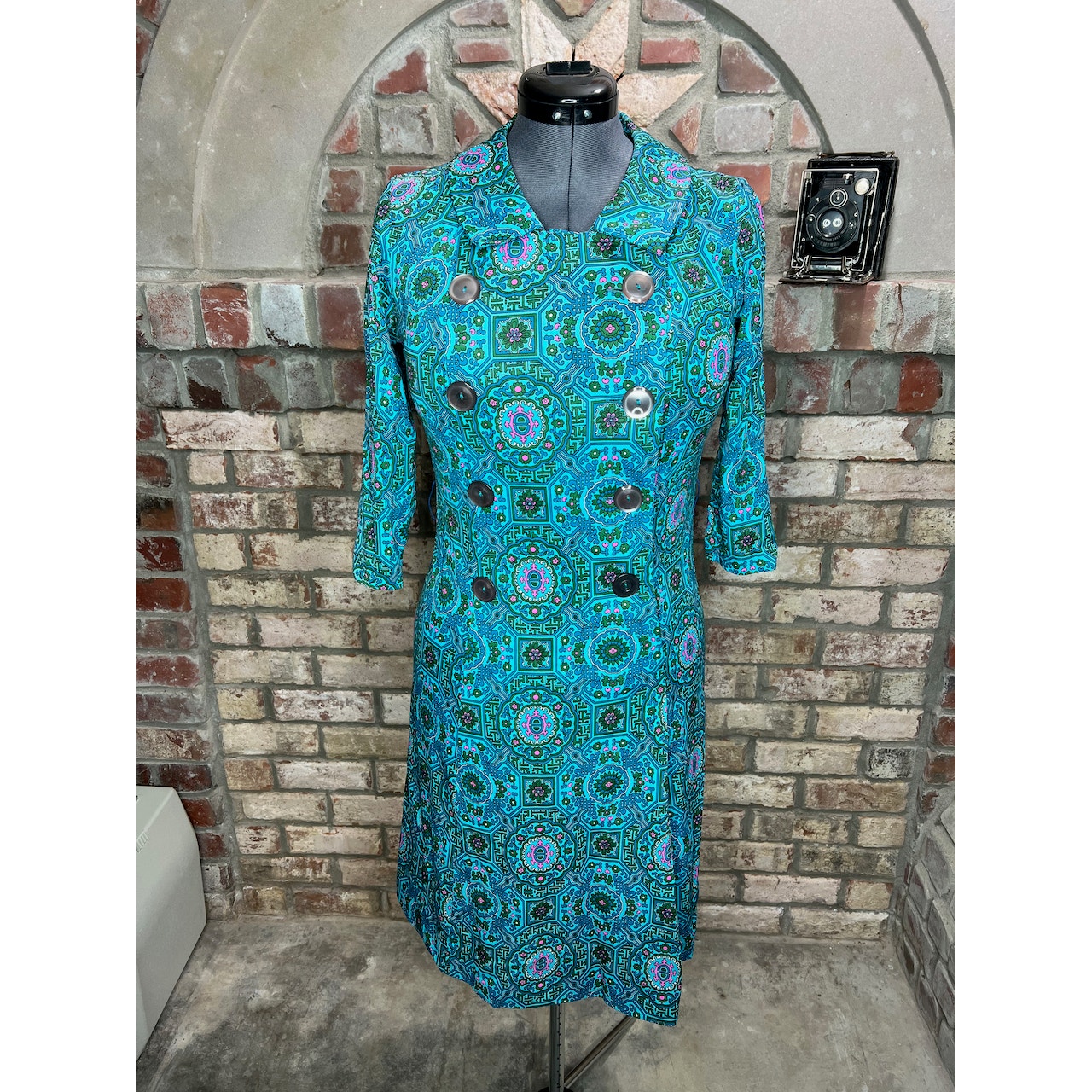 Shelton Stroller Dress fit and flare 1950s geometric aqua green double breasted