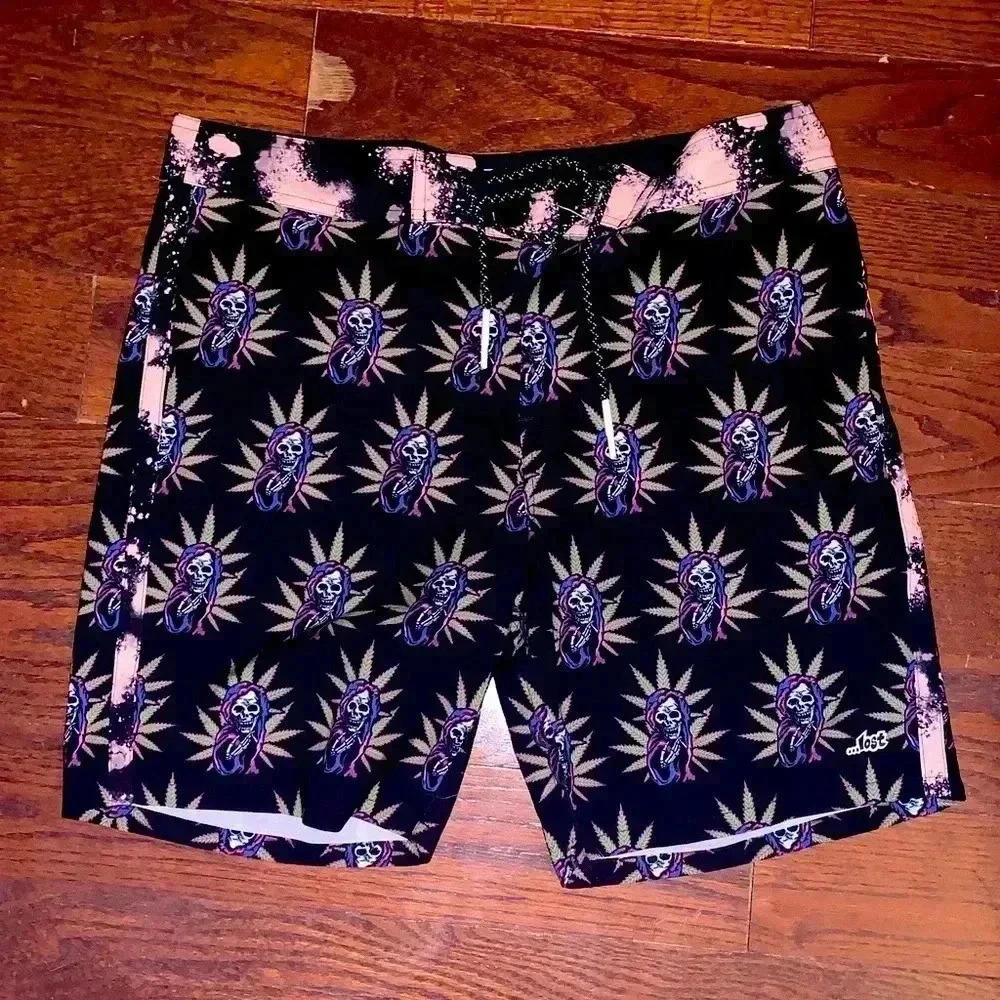 Lost Skull Print Board Shorts - Size 33