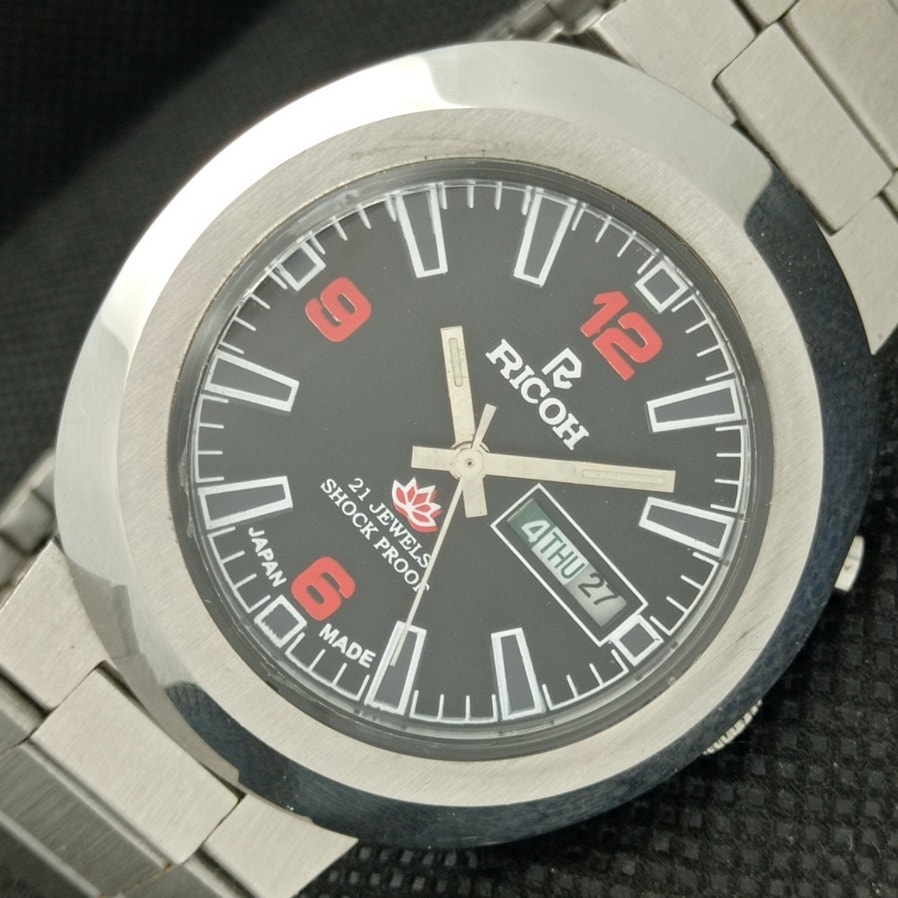 Vintage 1983 Ricoh Automatic Mens Silver Watch W/daydate & Red accents