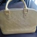 A Beautiful Yellow Patent Handbag