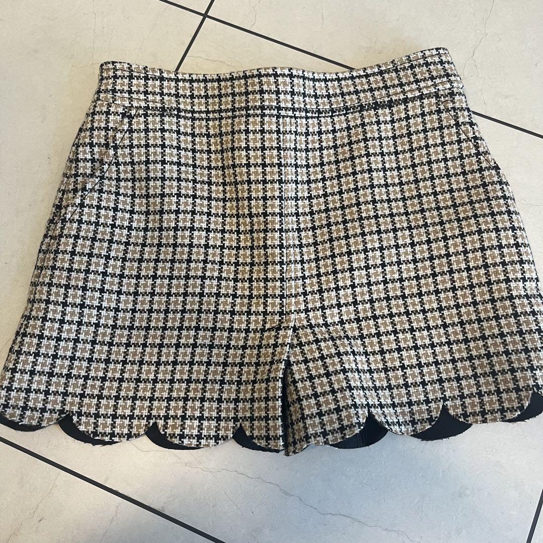 Wearing RED VALENTINO red Valentino mini skirt