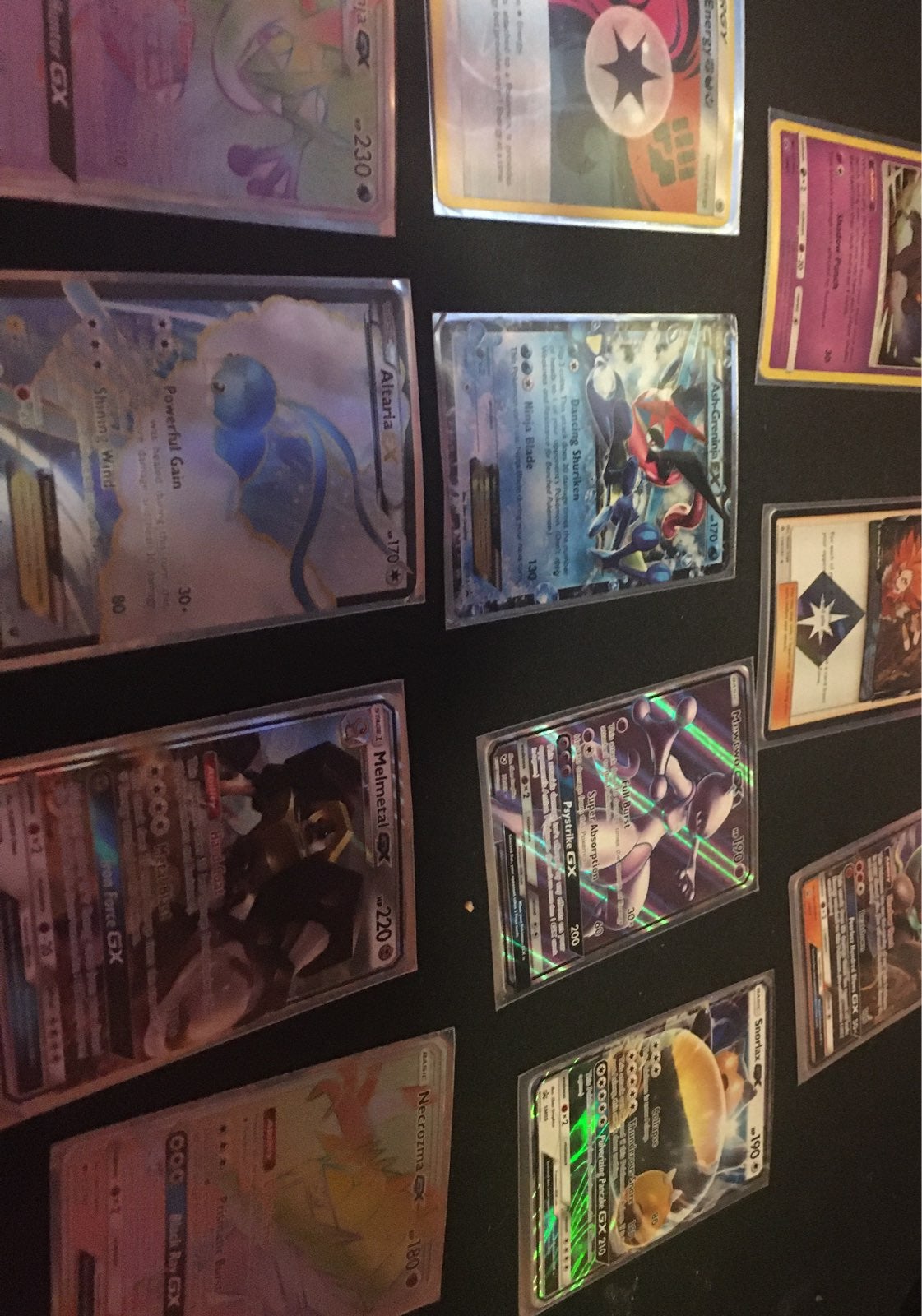 Pokemon cards and collectable marshadow tin The photo with the sleeve cards for